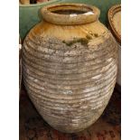 A glazed earthenware oil jar, H.88cm