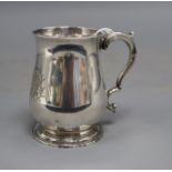 An early George III small silver baluster mug, with later engraved monogram, William Cripps, London,