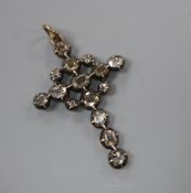An antique white metal and rose diamond set cross pendant, 29mm, gross weight 1.3 grams.CONDITION: