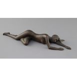 A bronze of a sleeping recumbent nude lady, length 28cmCONDITION: Good condition, would benefit from