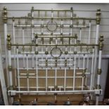 A late Victorian painted metal and brass mounted bedstead, with side irons, W.138cm H.