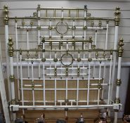 A late Victorian painted metal and brass mounted bedstead, with side irons, W.138cm H.