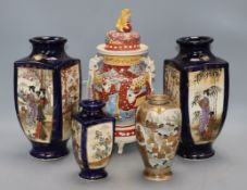 A pair of Japanese vases and three others