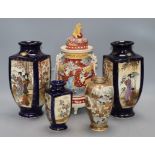 A pair of Japanese vases and three others