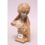 A resin bust of Scheherazade, signed F. Villanis, height 23cm