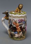 A Doccia Capo di Monte-style lidded tankard and cover, height 20cmCONDITION: Lion has been broken