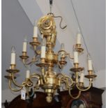 A gilt brass/ormolu baroque style twelve-light chandelier, diameter 73cm