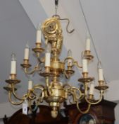 A gilt brass/ormolu baroque style twelve-light chandelier, diameter 73cm