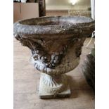 A reconstituted stone Campana garden urn on stand, H.62cm