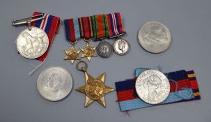Two WW2 war medals, a bar of four miniatures and sundries
