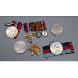 Two WW2 war medals, a bar of four miniatures and sundries