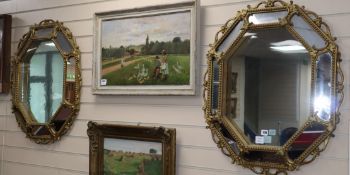 A pair of octagonal wall mirrors, W.69 x H.78cm.