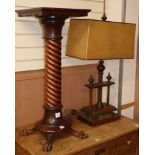 A book press converted to a lamp and a mahogany torchere, H.90cm