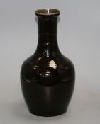 A Chinese dark brown glazed baluster vase, height 31cmCONDITION: Firing flaws particularly one