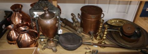 A collection of metalware, including a set of four graduated copper measuring jugs