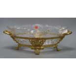 A cut glass bowl on ormolu stand, overall length 42cmCONDITION: Glass has several scratches, some