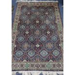 A Persian blue ground rug, 180 x 120cm.