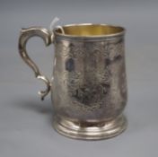 A Victorian silver christening mug with engraved inscription, Richards & Brown, London, 1867, 9.3cm,