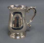 A George III silver baluster mug, with engraved initials, maker I.B, London, 1771, 12.8cm, 11.5 oz.