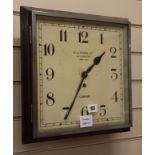 A W.C. Mann wall clock, dial 32cm square