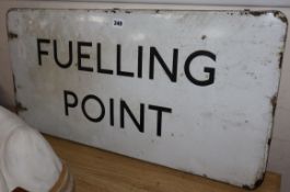 An enamelled Fuelling Point sign, 76 x 39cm