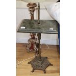 An Italian giltwood altar stick and a marble and cast iron stand, overall height 77cm