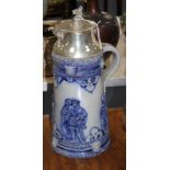 An early 20th century blue glazed German stoneware flagon, with silver plated griffon head mount,