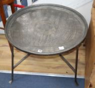 A Turkish tray top table, Diameter 78cm, H.50cm.