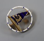 A 1950's 9ct gold and enamel set openwork circular pennant brooch, retailed by Benzies in Cowes,