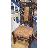 A pair of carved oak barleytwist chairs