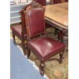 A set of ten late Victorian carved oak dining chairs