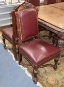 A set of ten late Victorian carved oak dining chairs