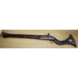 An Indo-Persian mother of pearl inlaid blunderbuss, length 100cm