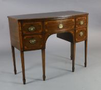 A George III inlaid mahogany bowfront sideboard,fitted five drawers, on squared tapered legs with