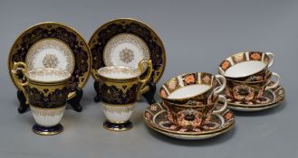 Four pairs of Royal Crown Derby 'Old Imari' pattern cups and saucers and two pairs of Coalport