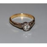 A modern 18ct gold and illusion set solitaire diamond ring, size M, gross 3.1 grams.CONDITION: Stone