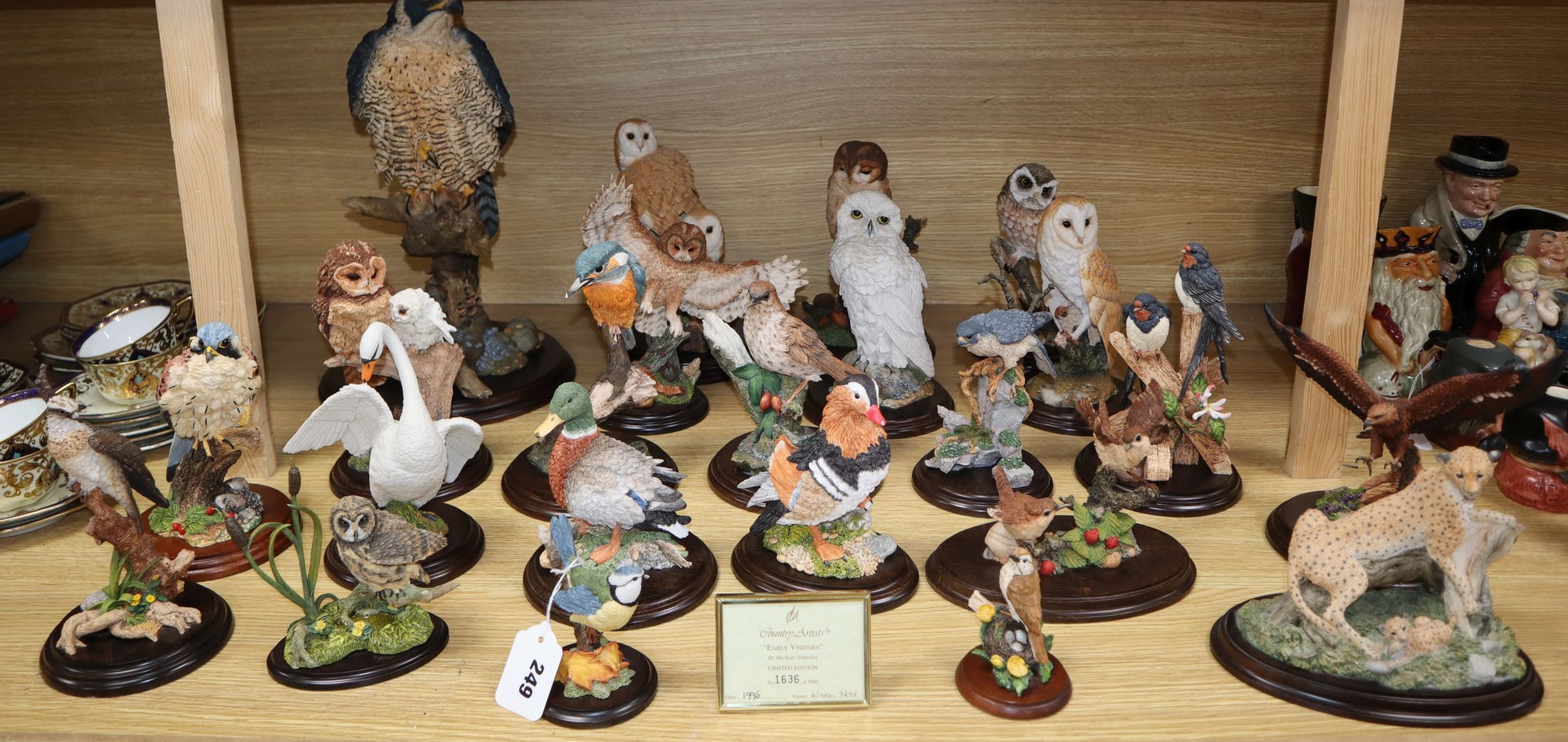 A collection of Country Artists and other resin models of birds and animals, including a large