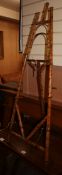 A Victorian bamboo easel, W.43cm H.115cm