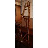 A Victorian bamboo easel, W.43cm H.115cm