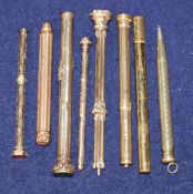 A collection of gold / gilt pens and pencils