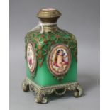 A 19th century French gilt metal mounted glass scent bottle, inset with painted and enamelled
