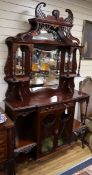 A late Victorian mahogany mirrored back side cabinet, W.136cm, D.38cm., H.234cm Condition report: