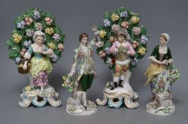 A Sitzendorf pair of shepherd and shepherdess figures holding flowers and a pair of Samson Chelsea