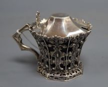 A Victorian pierced silver mustard, with flared rim and blue glass liner, J & J Angell, London,