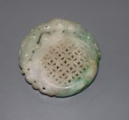 A carved jade plaque, diameter 5cm