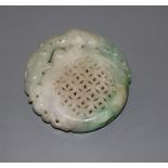 A carved jade plaque, diameter 5cm