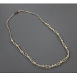 A single and part double strand cultured and seed pearl necklace, 47cm.