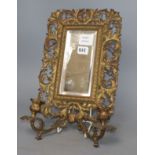 A Victorian gilt metal two sconce wall mirror, W.24cm, H.40cm.CONDITION: Two the left of the plate