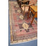 A Kazak red ground hall carpet, 430 x 138cm.
