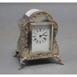 A late Victorian repousse silver mounted timepiece, by William Comyns, London, 1900, 9.5cm, with